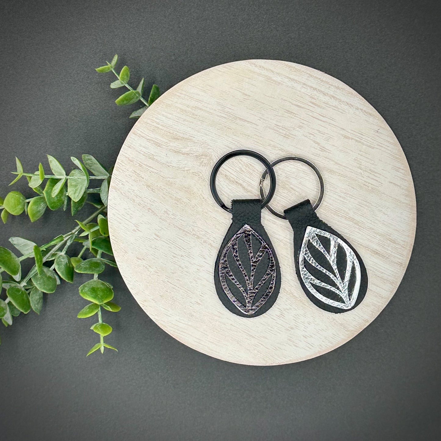 Genuine Leather Metallic Leaf Keychain | 1.25" Key Ring | Natural Black and Silver Leaf Motif Keyring, Monstera Olbliqua Leaf