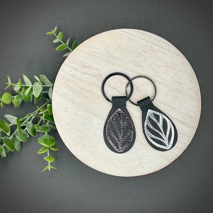 Genuine Leather Metallic Leaf Keychain | 1.25" Key Ring | Natural Black and Silver Leaf Motif Keyring, Monstera Olbliqua Leaf